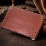 Надійний шкіряний затискач для грошей GRANDE PELLE 11668 Коричневий